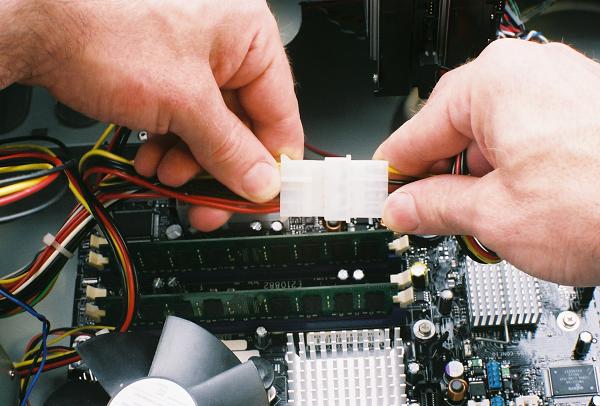 Connecting the old style power supply lead to an SATA power adapter